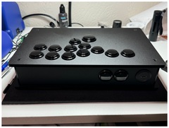 Rear side of the controller, showing 2 of the option buttons and the USB-C passthrough